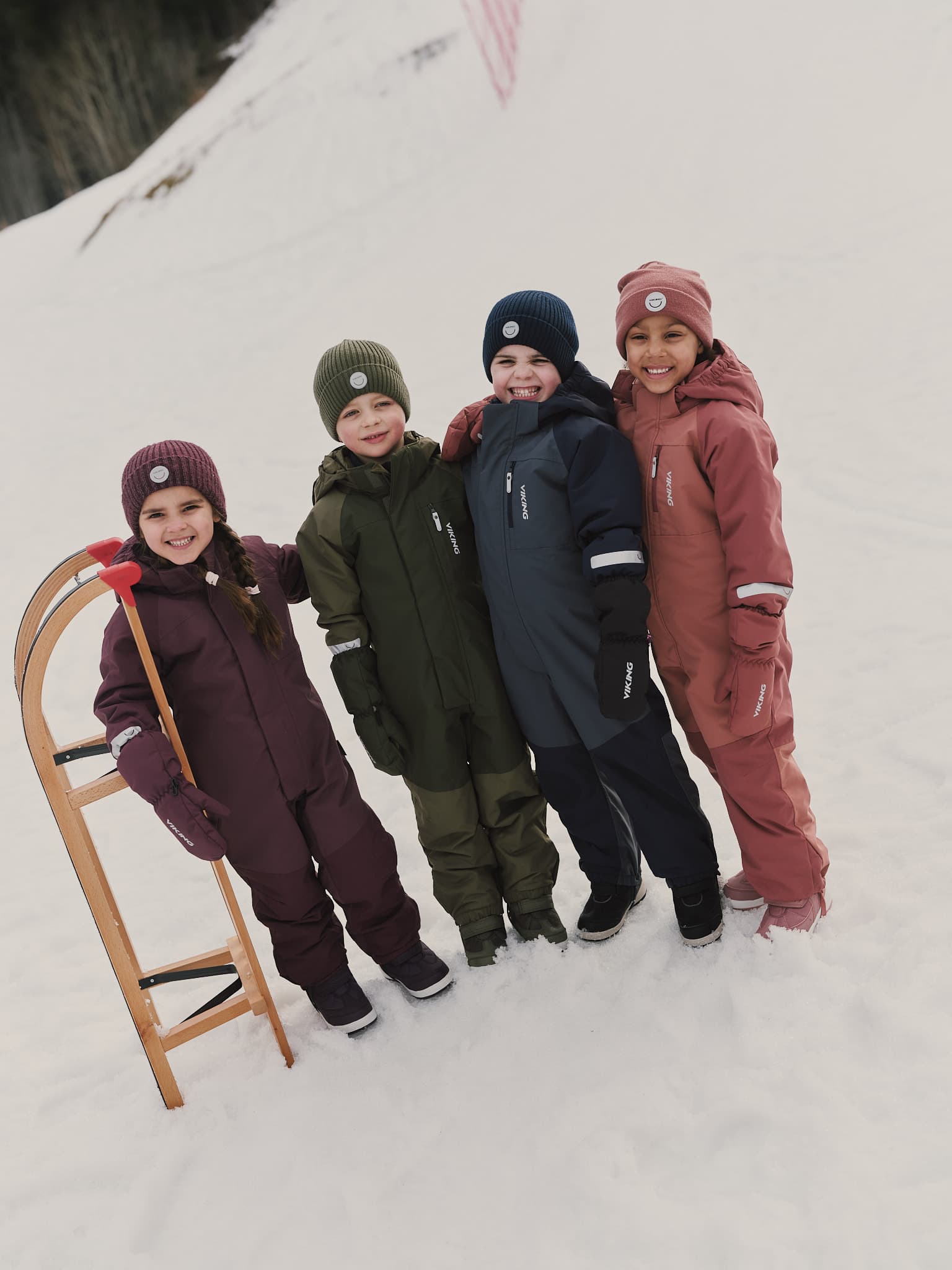 Image of kids wearing winter playsuits from Viking.